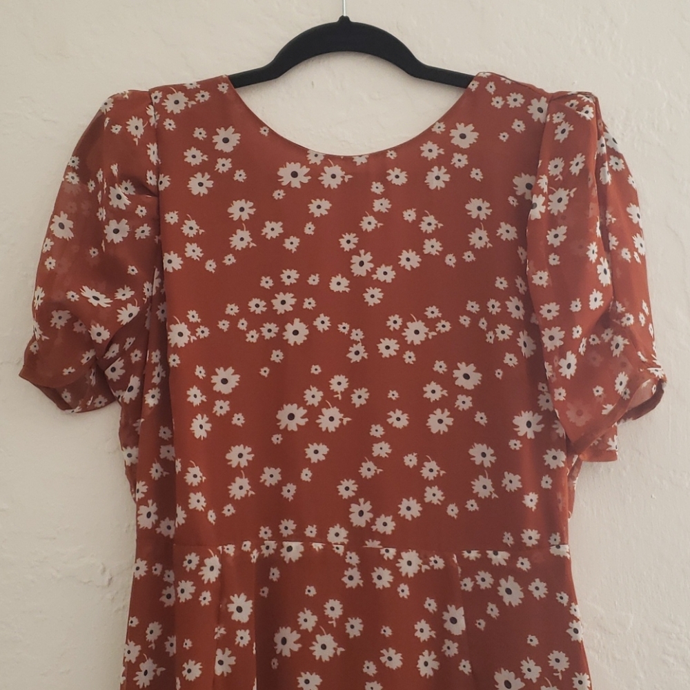 Rust colored floral dress with ruffled cap sleeves